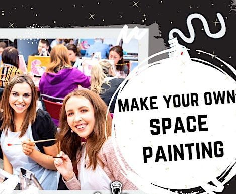 two woman drawing on a canva and having fun